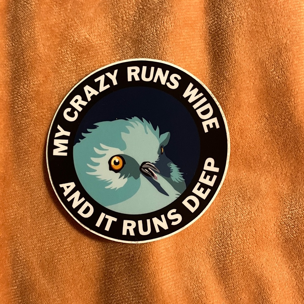 Bird-Themed Sticker with Blue and Black Design